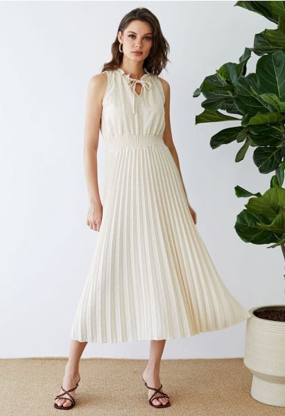 Tie-Neck Flock Dot Pleated Dress in Cream