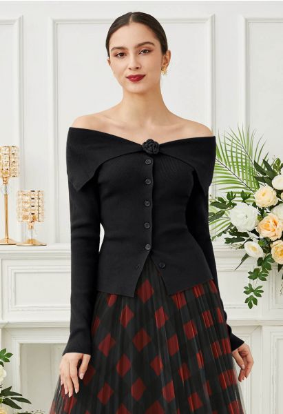 Floral Brooch Off-Shoulder Buttoned Knit Top in Black