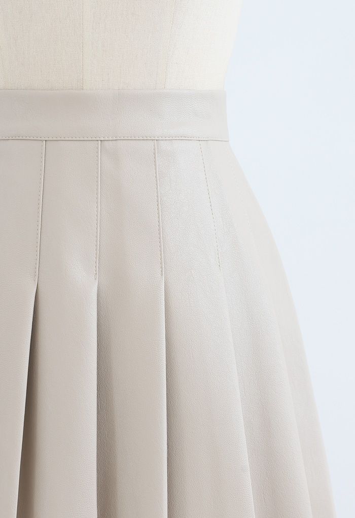 Pleated Faux Leather Mini Skirt in Cream