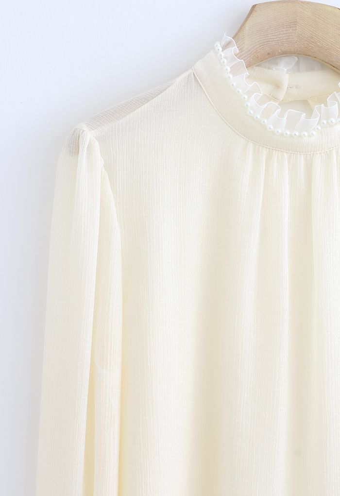 Glittery Ruffle Neck Pearls Trim Top in Ivory