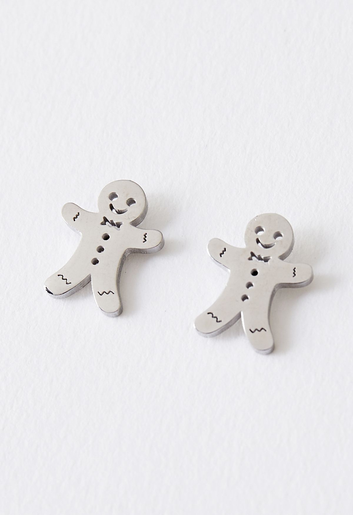 Cute Biscuit Man Earrings in Silver