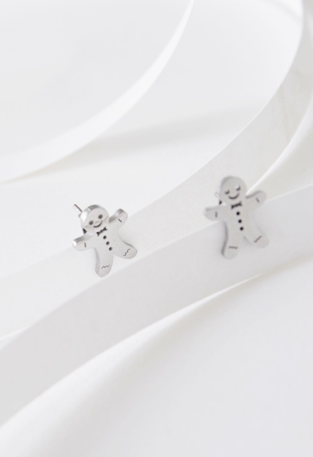 Cute Biscuit Man Earrings in Silver