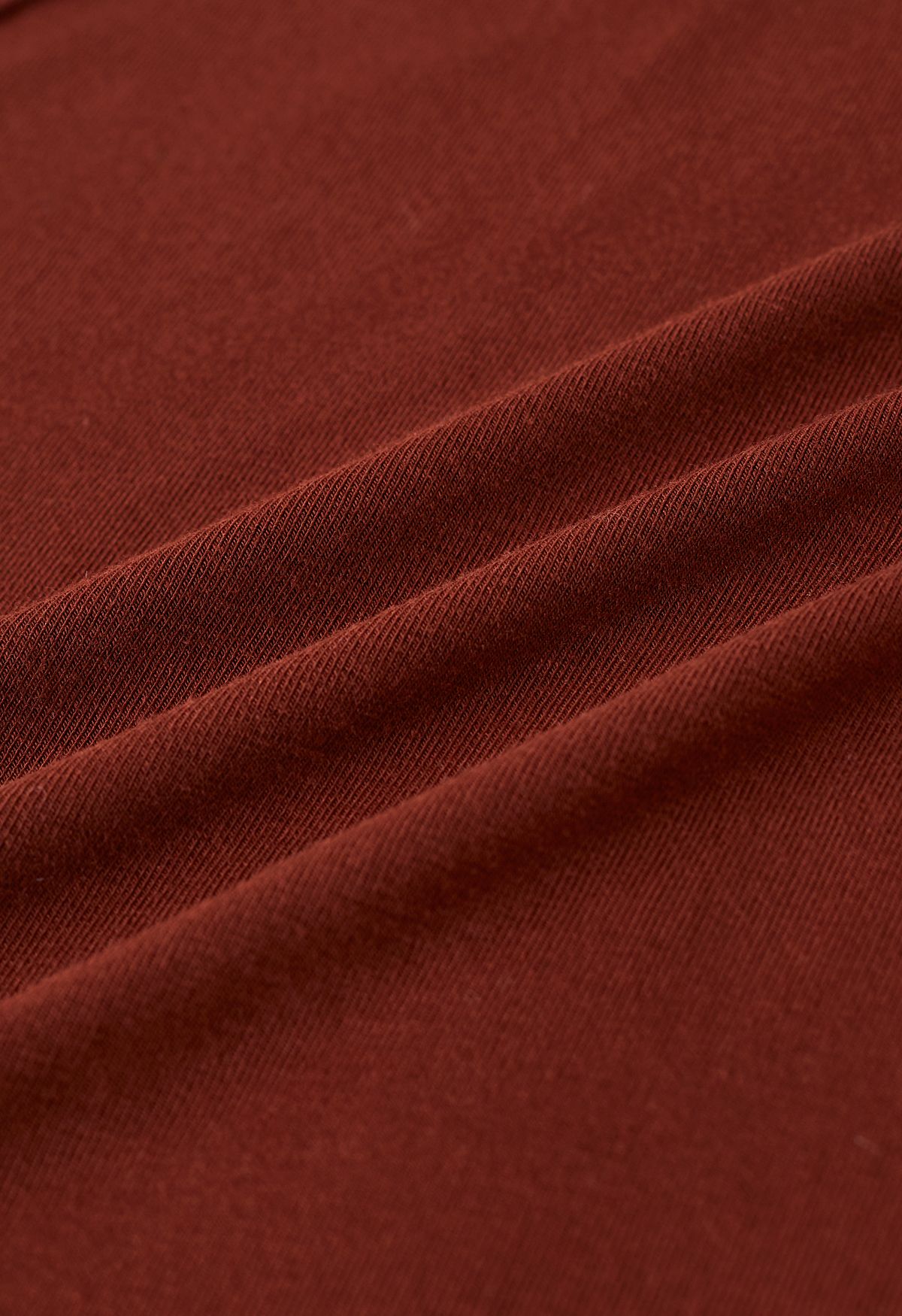 Embossed Seam Detail High Neck Knit Top in Rust Red