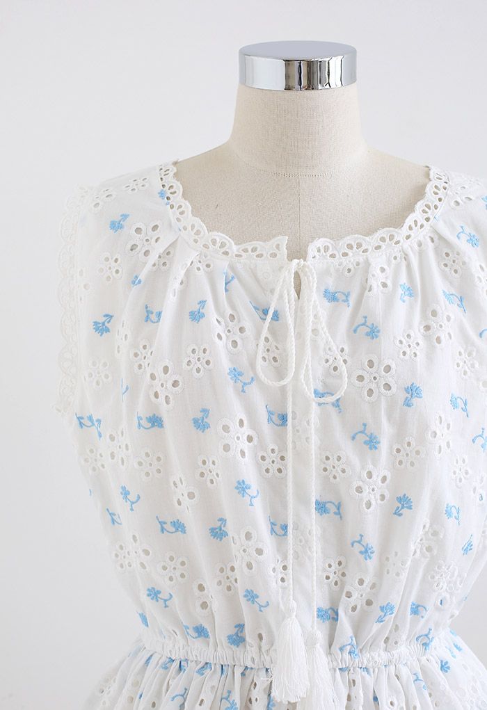 Flower Embroidery Sleeveless Peplum Top in White
