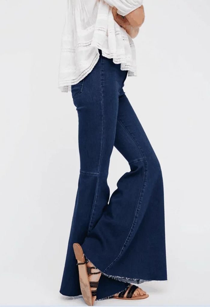 Stretchy Raw Hem Flare Jeans in Dark Blue