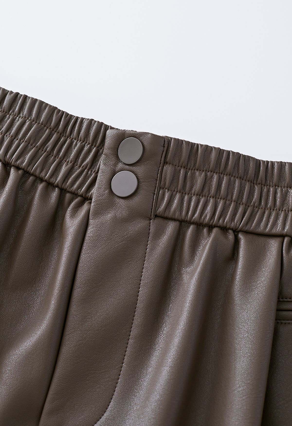 Textured Buttoned Faux Leather Shorts in Brown