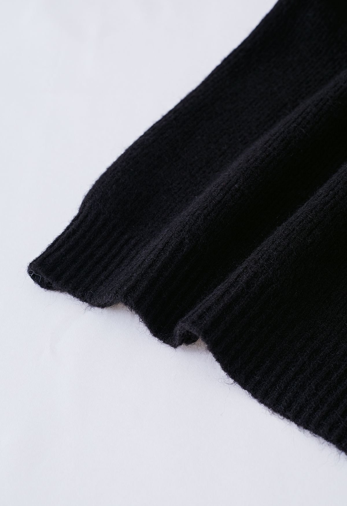 Cutout Pearl Neckline Knit Sweater in Black