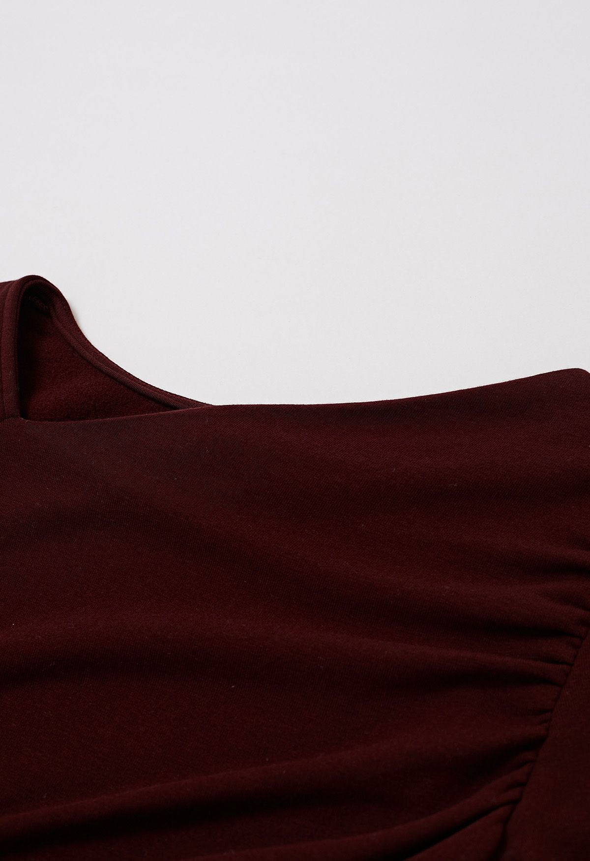 Asymmetric Neck Ruched Long Sleeve Top in Burgundy