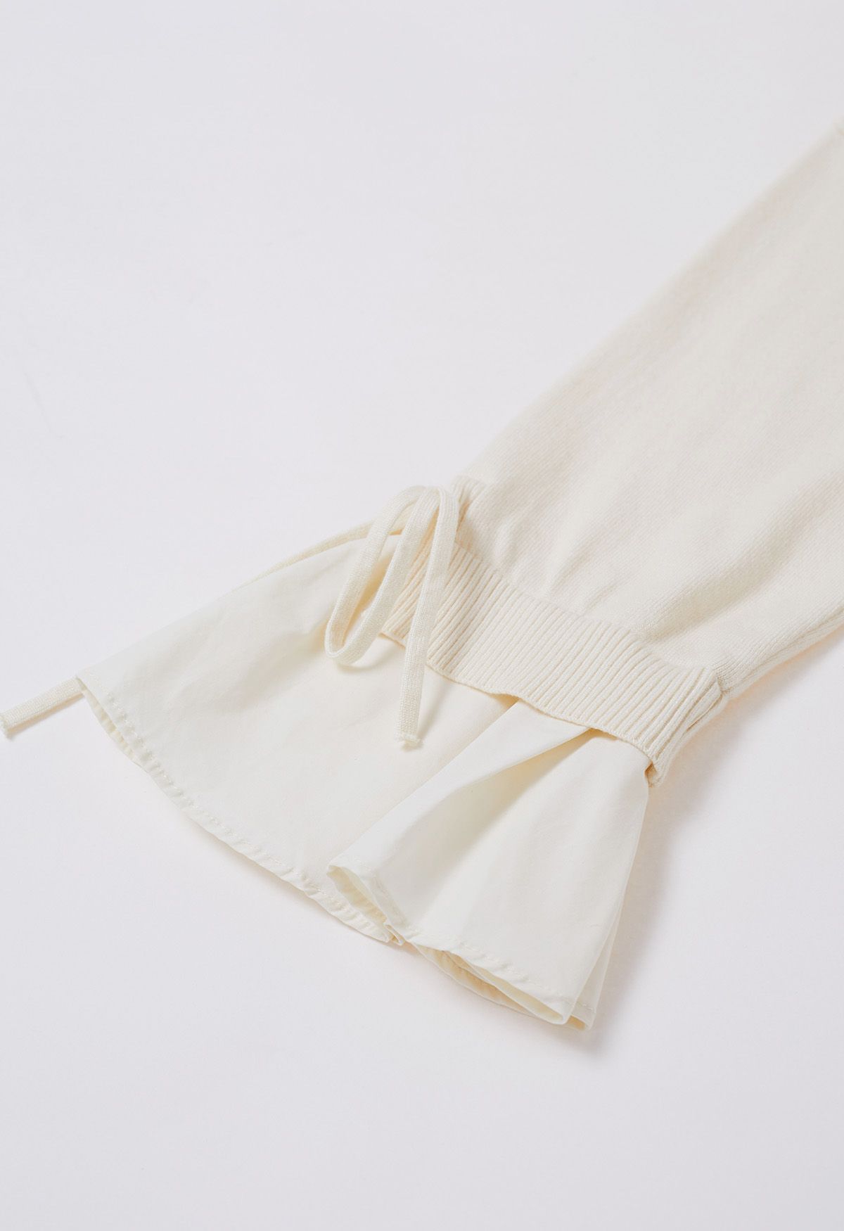 Tie-String Cuffs Spliced Cotton Hem Knit Top in Cream