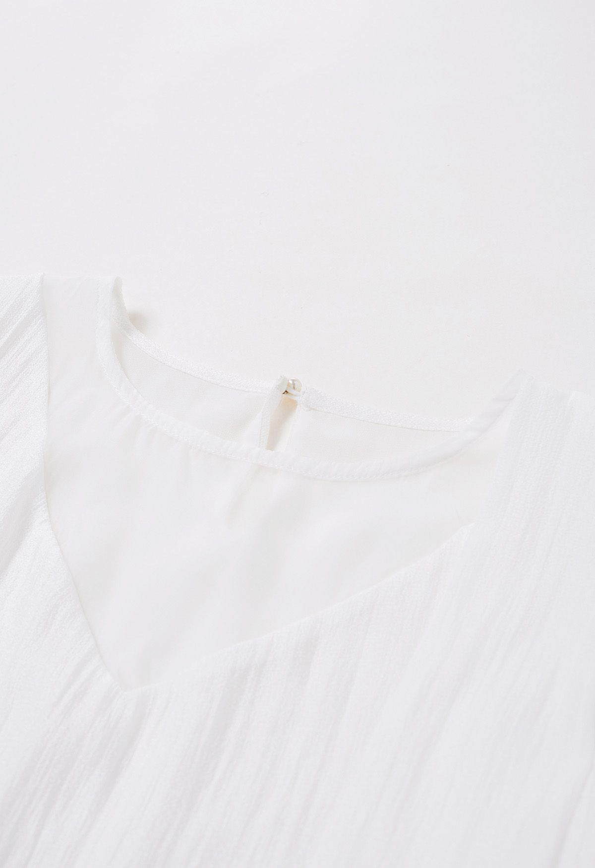 Self-Tie Side Bowknot Sheer Top in White