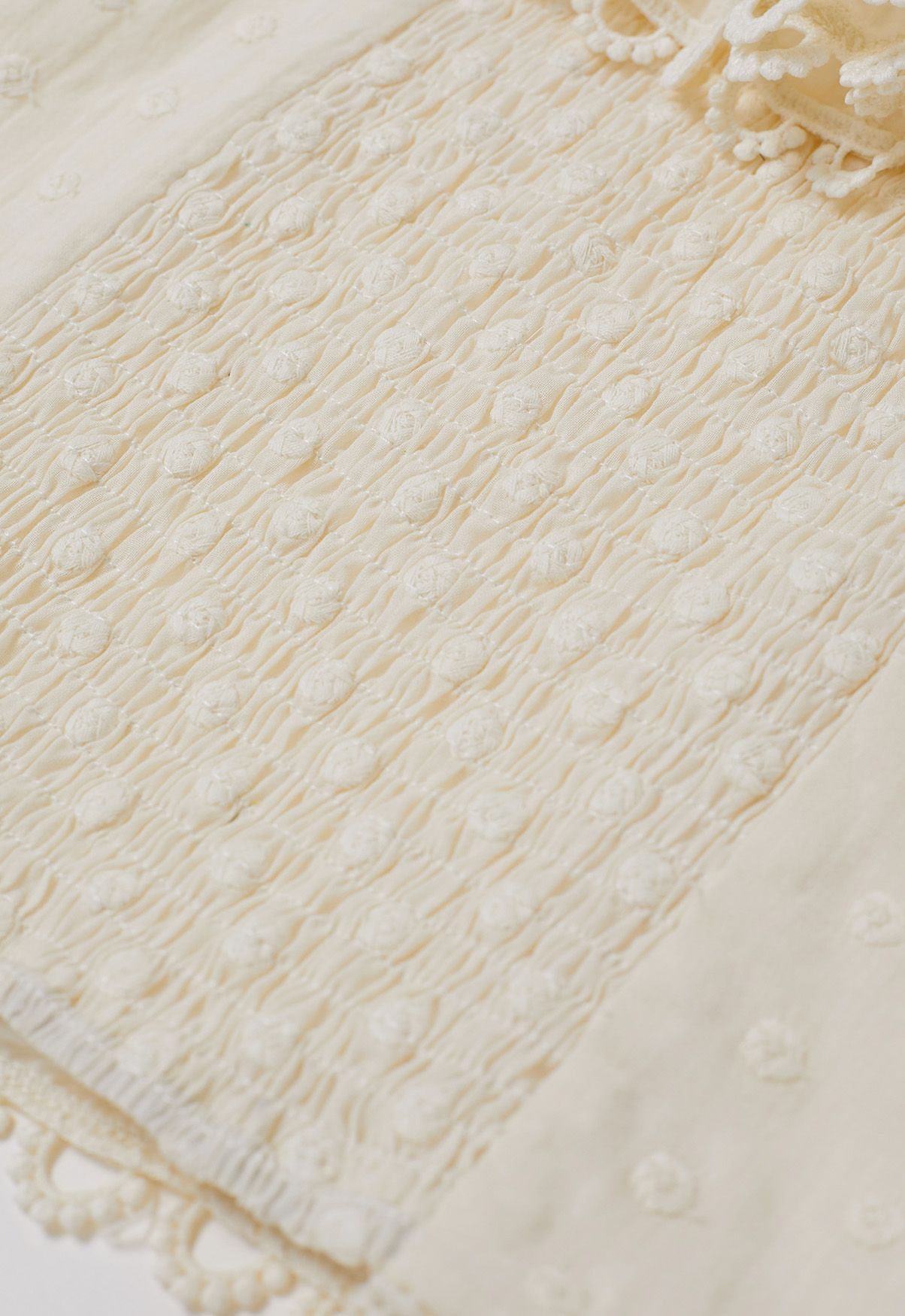 Crochet Edge Dotted Off-Shoulder Crop Top in Cream