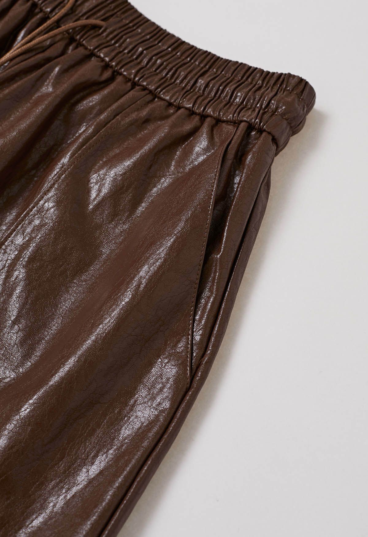 Urban Chic Faux Leather Drawstring Shorts in Brown