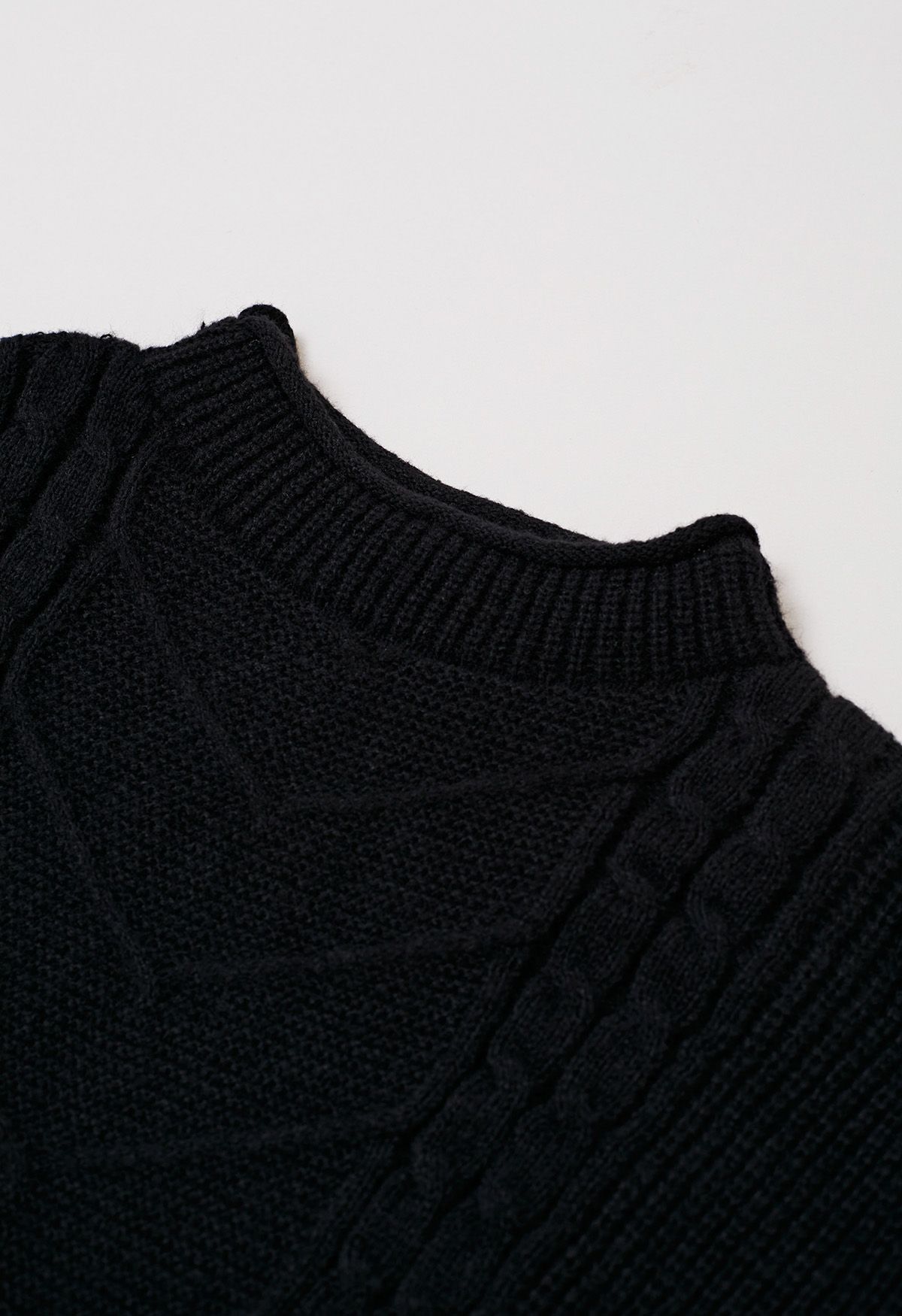 Mock Neck Padded Shoulder Cable Knit Top in Black