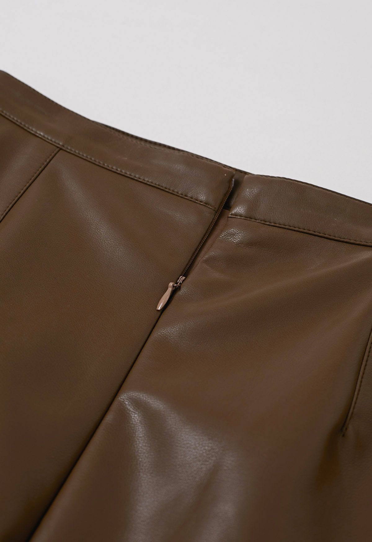 Smooth Silhouette Faux Leather Split Maxi Skirt in Brown