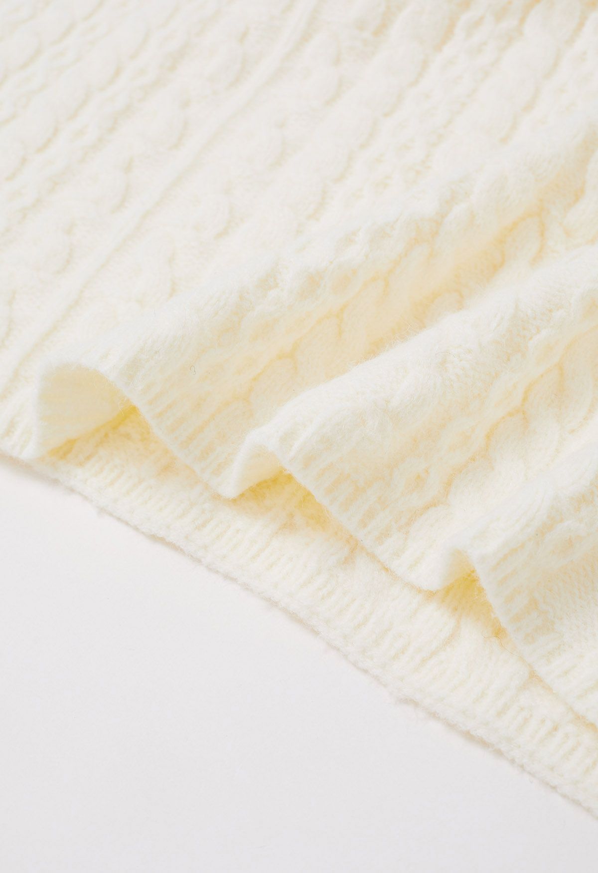 Warmth Turtleneck Cable Knit Cape Sweater in Ivory