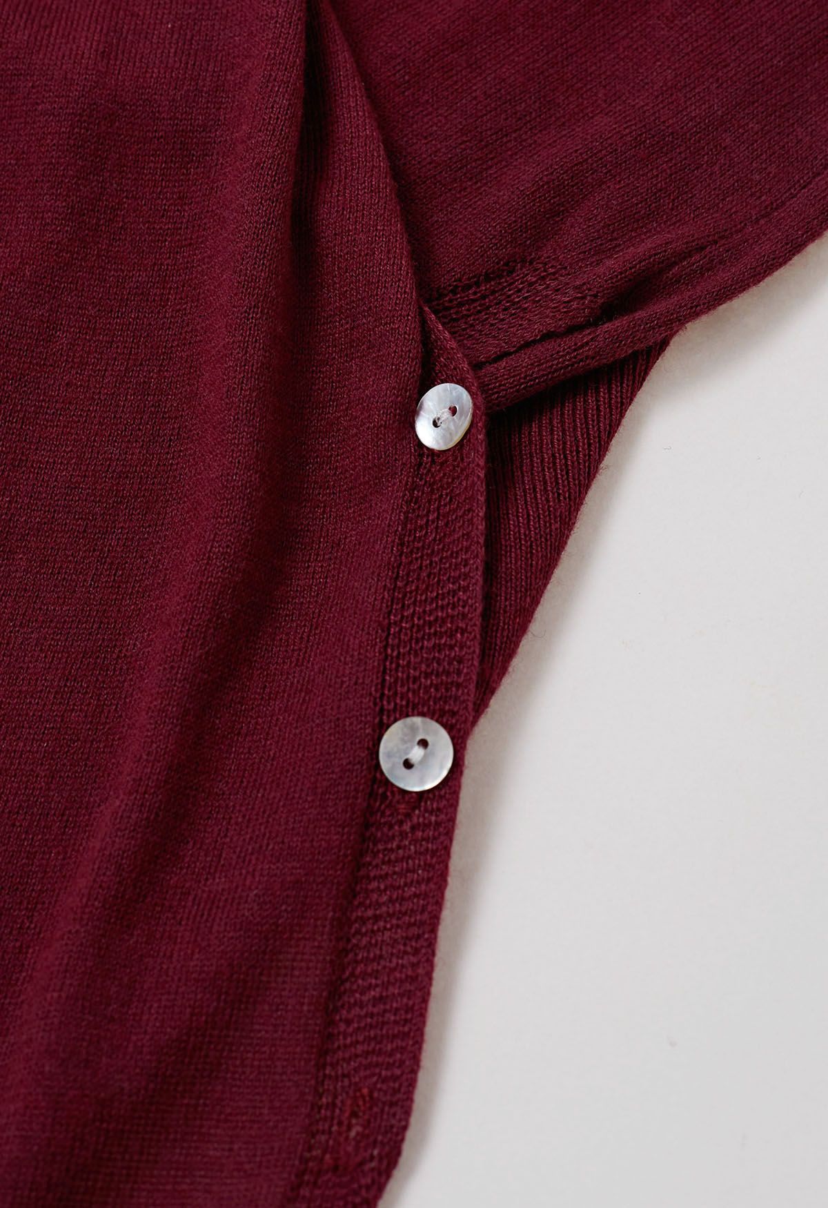 Fascinating Crisscross Buttoned Knit Top in Burgundy