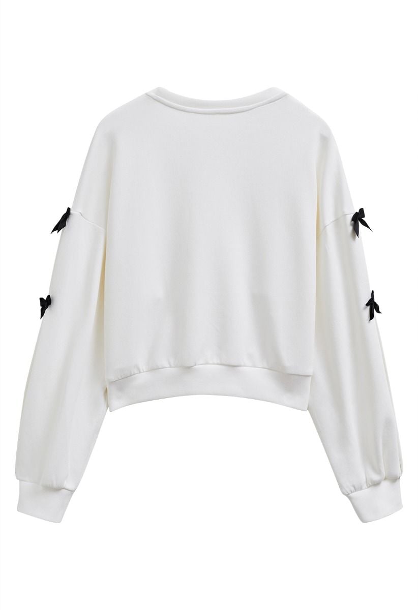 Bowknot Adorned Sleeve Cropped Sweatshirt in White