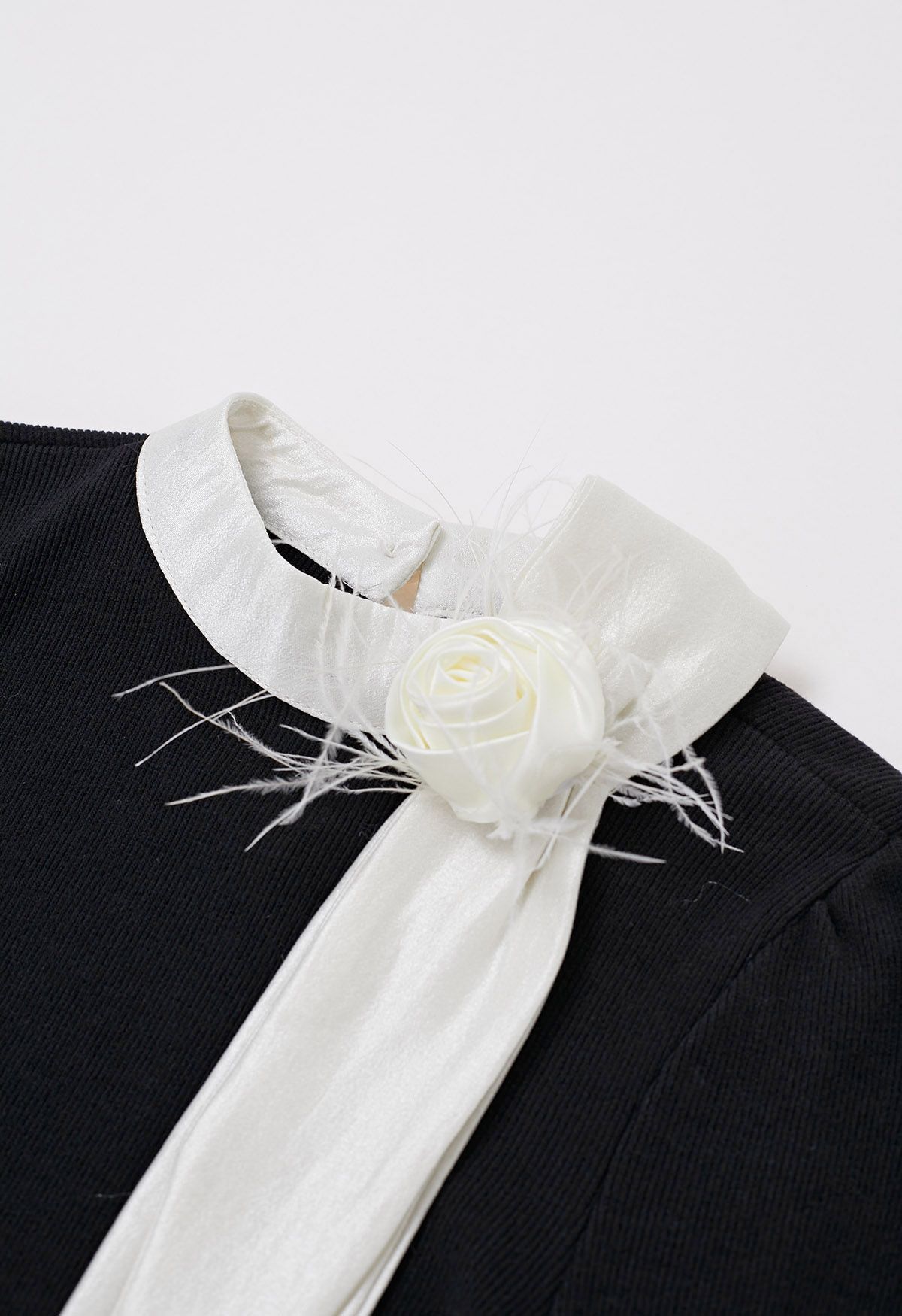 Rose Feather Brooch Ribbed Knit Top in Black