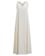 Solid Twist Open Back Halter Maxi Dress in Cream